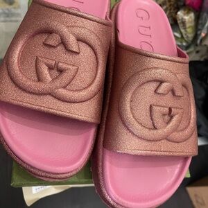 Pink glitter Gucci slides